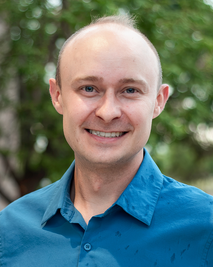 Headshot of Riley Coltrin.